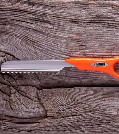 Короткая филировочная бритва для стрижки волос Feather Styling Razor SRS-R оранжевого цвета